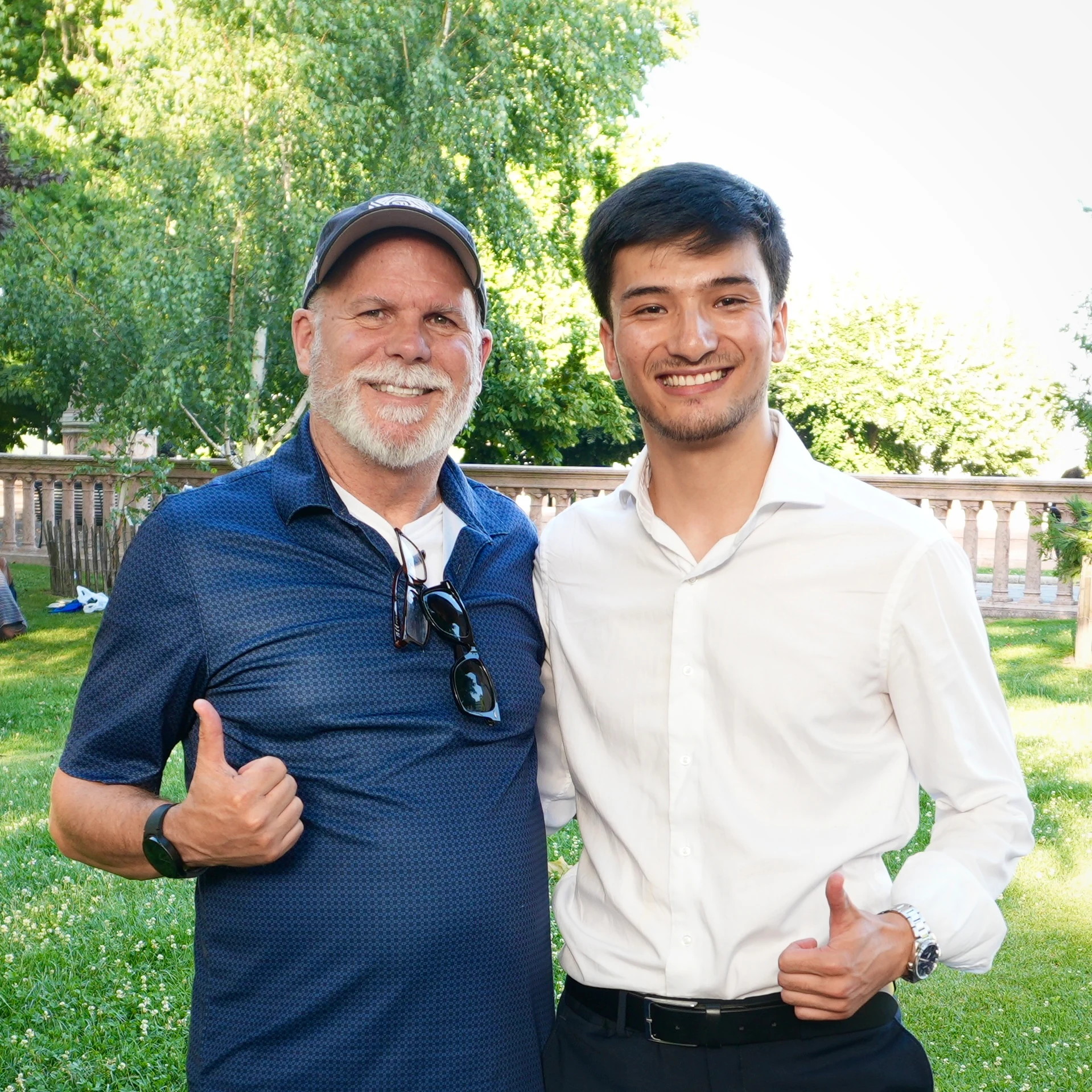 Jawid Amani, Founder of Change Makers of the World, with advisor Timothy James Stiven in Geneva, Switzerland, discussing Afghan girls’ education and the partnership between Change Makers of the World and Flowers for the Future International following the 2026 Global Teacher Prize.